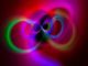 alt="colorful infinity symbol spinning"